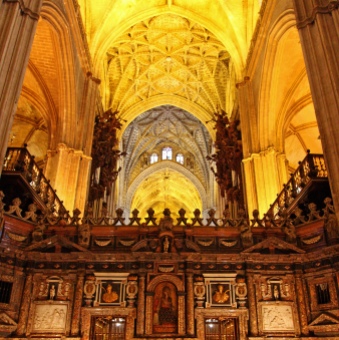 High arches, vaulted ceilings amidst a warm yellow hue - even the interior looks gothic.