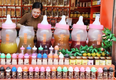 Various drinks and preserved plums in quirky containers. Ice jelly is a hot favourite in Taipei, and a godsend in hot weather.